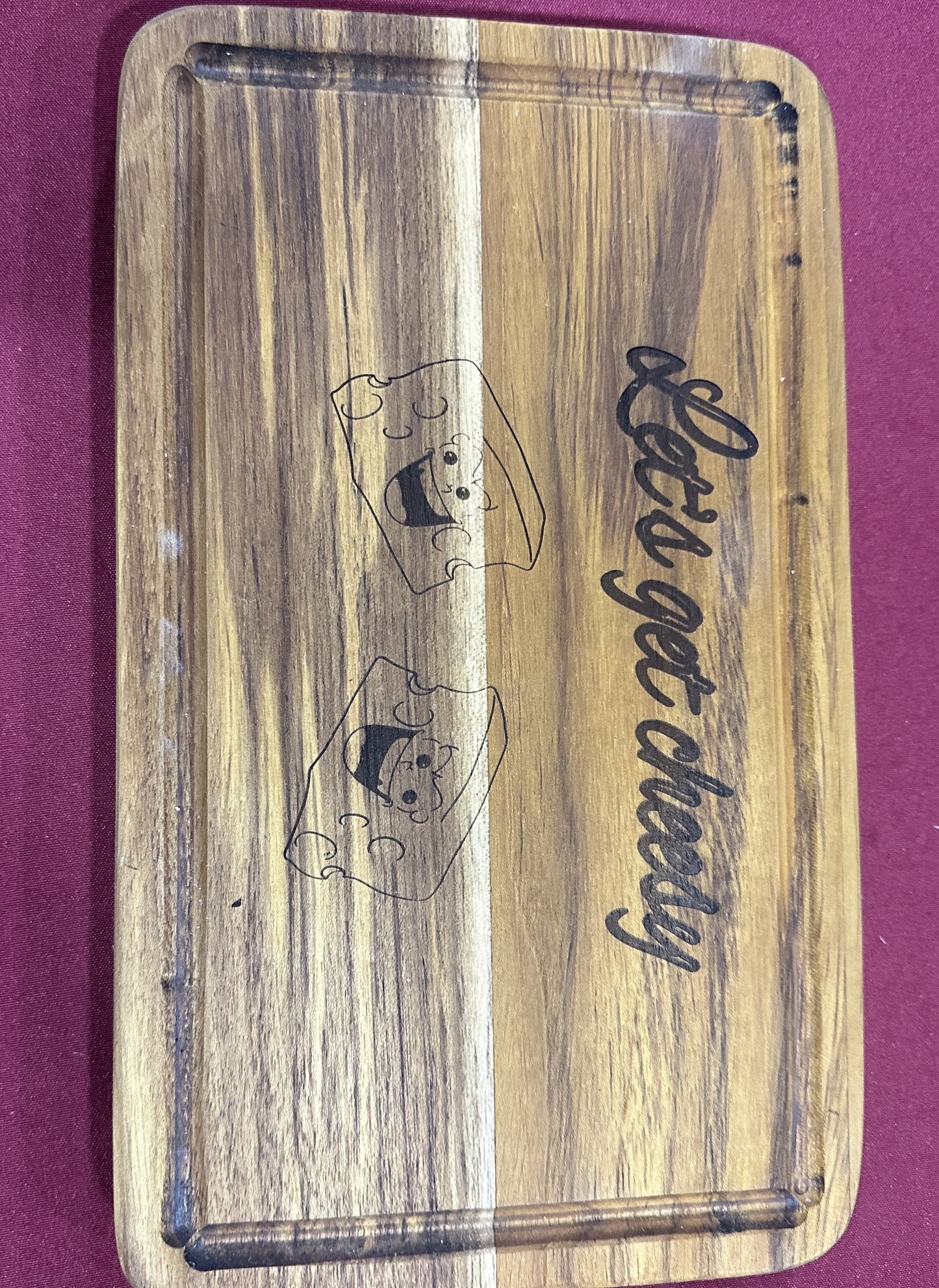 Handmade teak engraved medium cutting board
