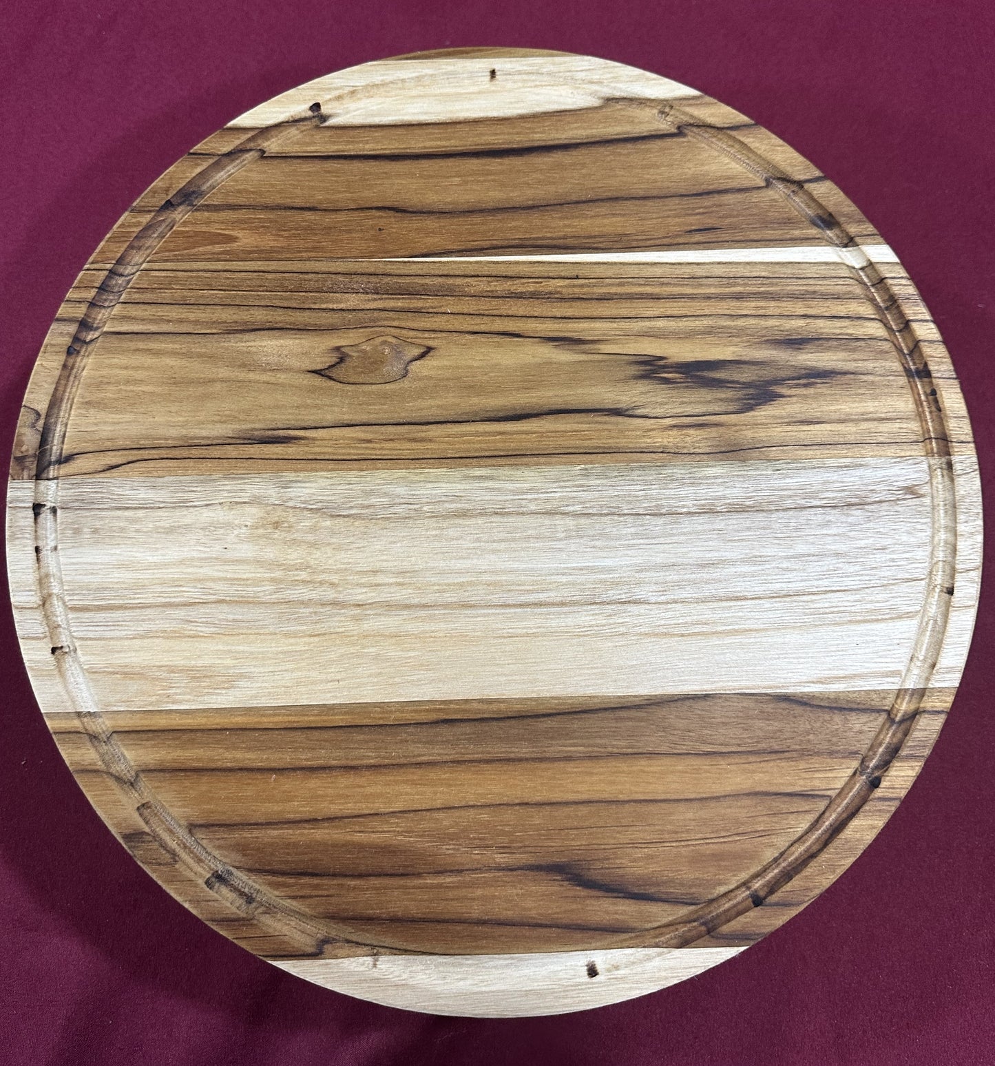 Handmade teak wood round cutting board